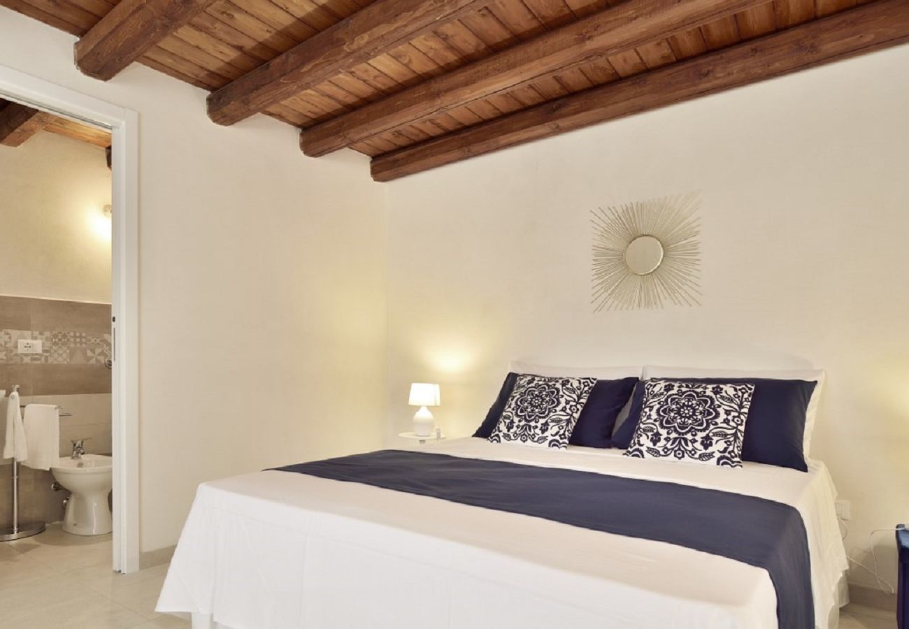 camera da letto CASA DEI LIMONI con piscina BLU Affitti Brevi Italia Villa a Noto - CASA DEI LIMONI CON PISCINA BLU