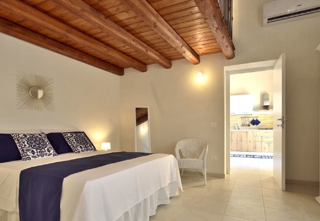 camera da letto CASA DEI LIMONI con piscina BLU Affitti Brevi Italia Villa a Noto - CASA DEI LIMONI CON PISCINA BLU