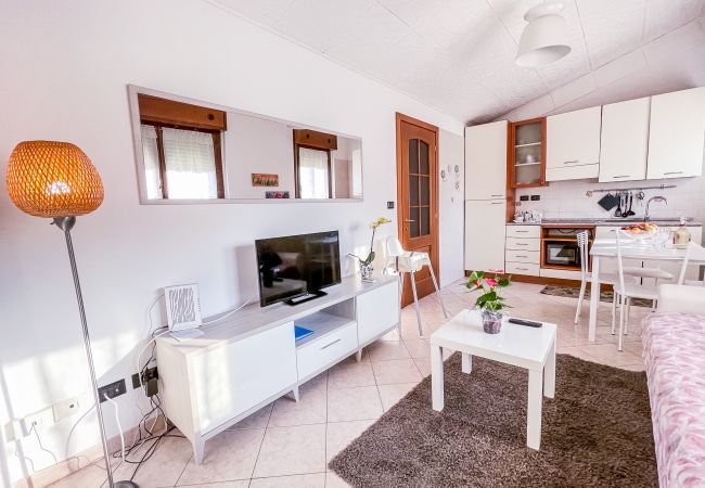 Comfort and Style: Living room with kitchenette and sofa bed MYHOUSE INN TURIN - Short-term rentals Italy Cozy living room with kitchenette, furnished with style and comfort