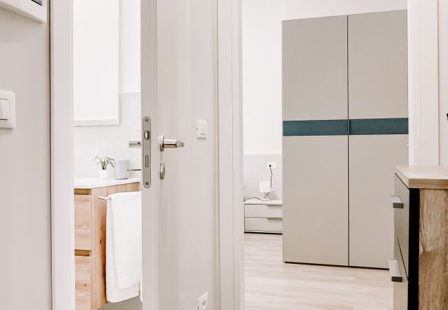 Hallway that stylishly separates the living area from the sleeping area and with access to the bathroom. Hallway that separates the living area from the sleeping area and with access to the bathroom.