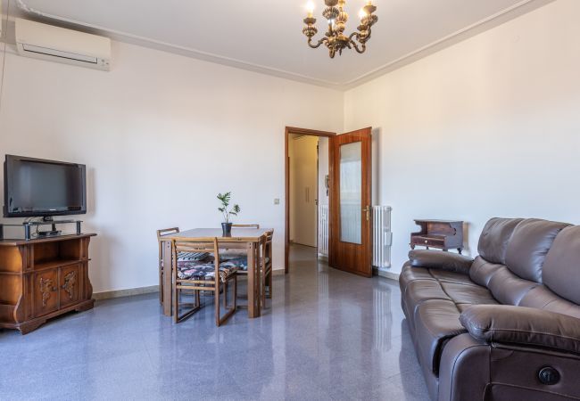 large and bright living area with tv, a/c and balcony large and bright living area with tv, a/c and balcony