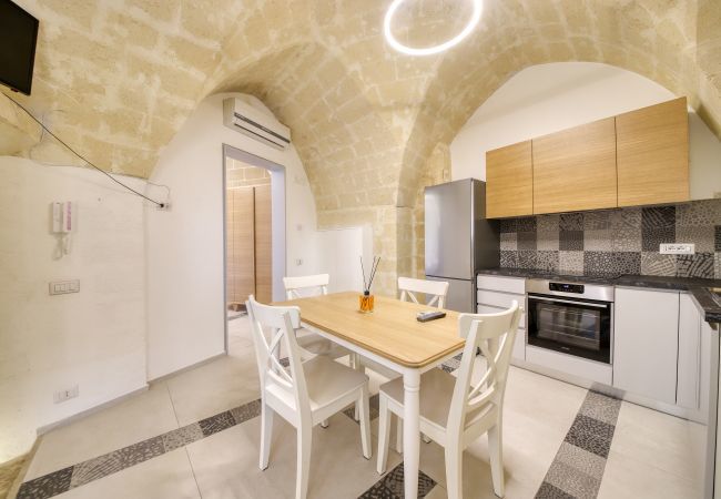 dining room Palazzo Fondo Vico 2   Affitti Brevi Italia Apartment in Gravina in Puglia - Palazzo Fondo Vico 2 - Affitti Brevi Italia