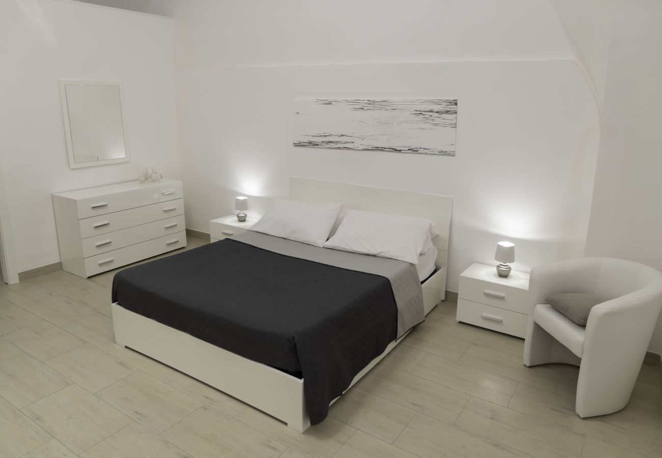 camera da letto Apartment White Place - Affitti Brevi Italia bedroom Apartment White Place - Affitti Brevi Italia
