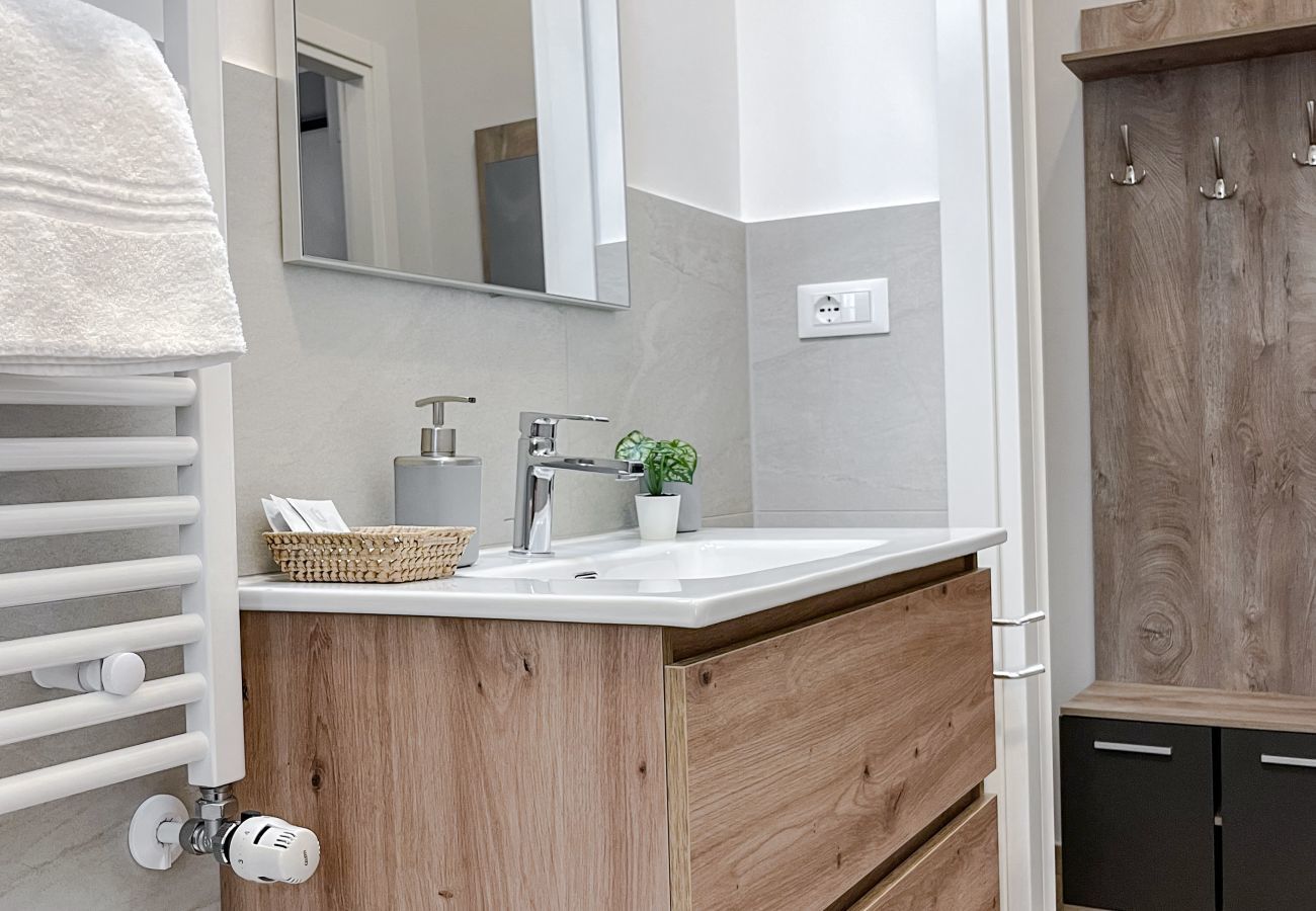 Bathroom cabinet with sink, comfortable drawers, illuminated mirror and courtesy line. Bathroom cabinet with sink, comfortable drawers, illuminated mirror and courtesy line.