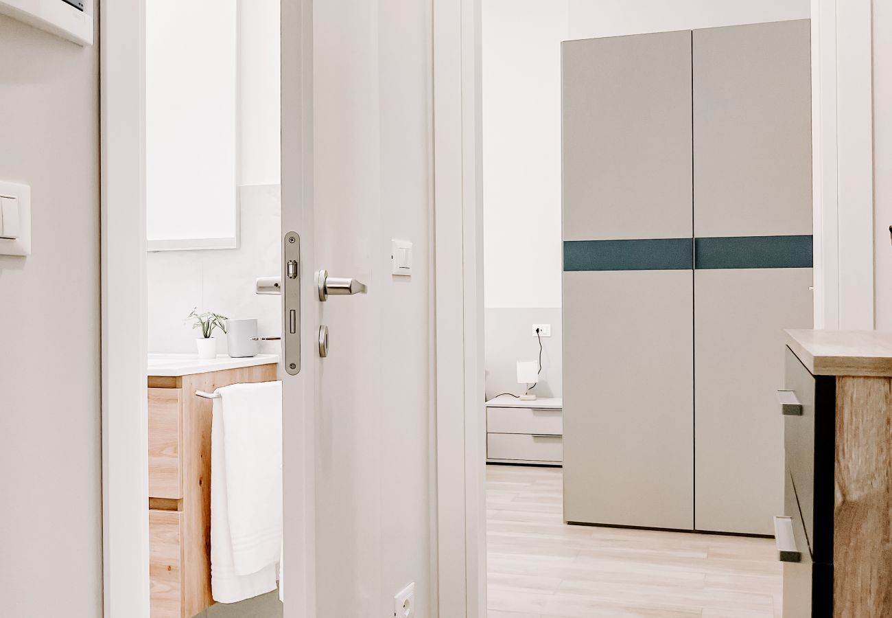 Hallway that stylishly separates the living area from the sleeping area and with access to the bathroom. Hallway that separates the living area from the sleeping area and with access to the bathroom.