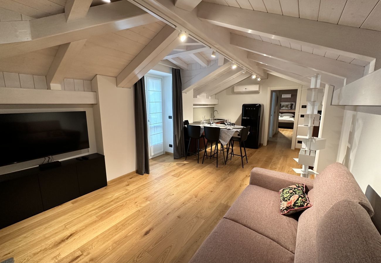 Living room Mansard Apartment D - PIOL42 Attic room equipped with every comfort