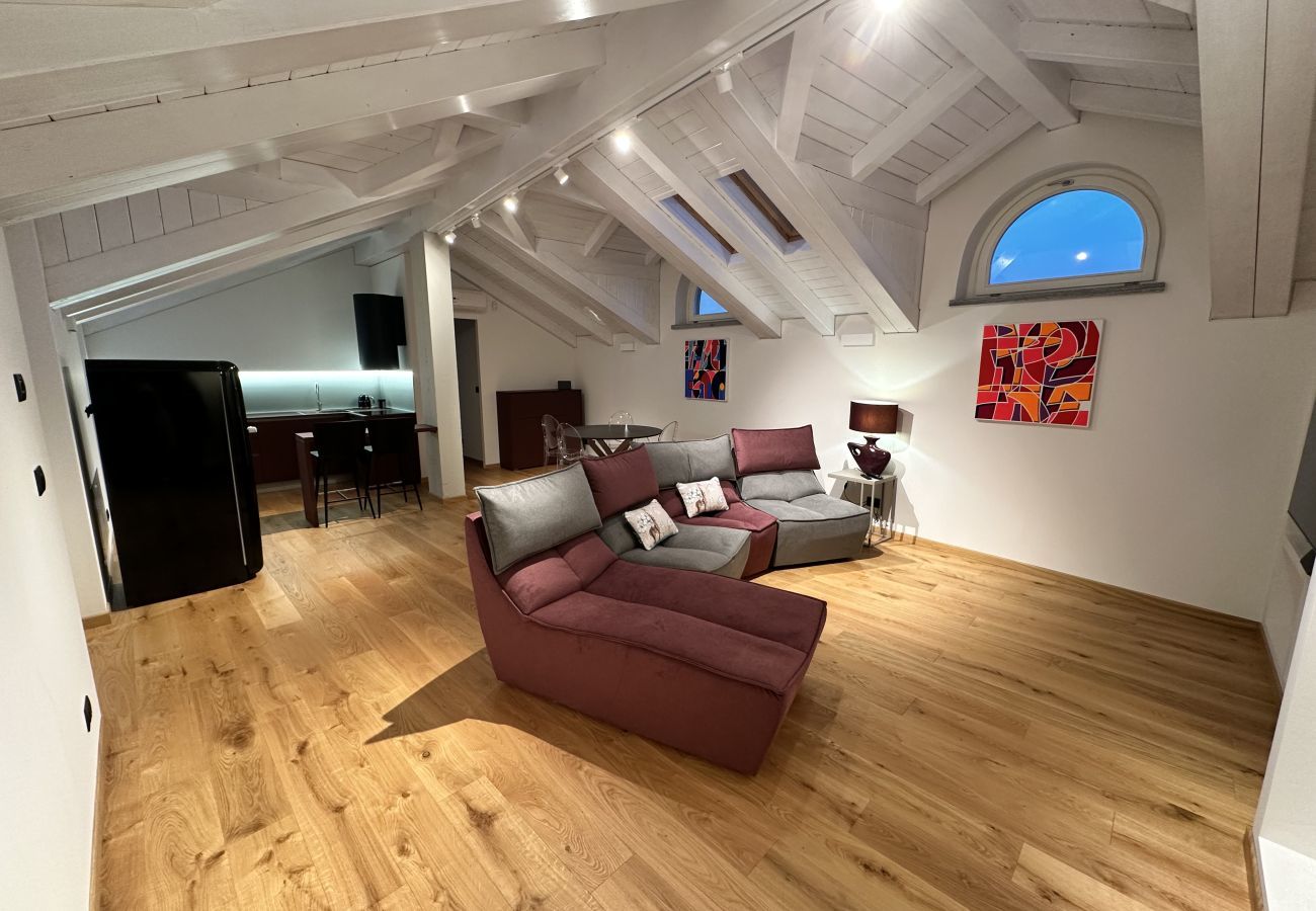 Attic Living Room E - PIOL42 Attic room equipped with every comfort
