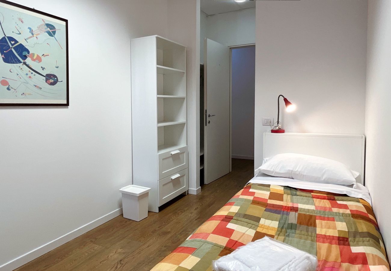 Comfortable single bed Lovely bedroom with single bed and accessories