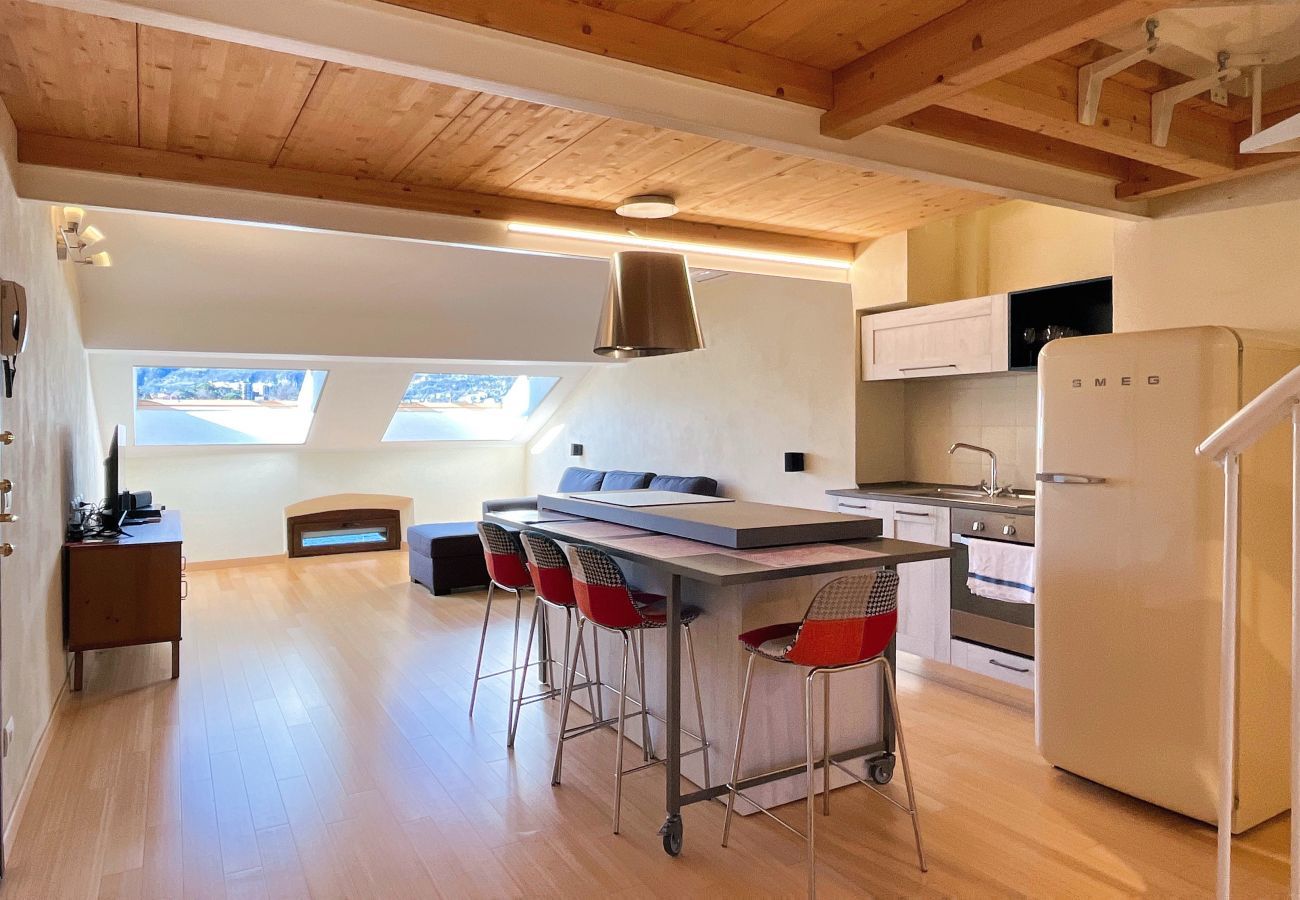 Bright kitchen and living room with dining table Bright kitchen and living room with dining table